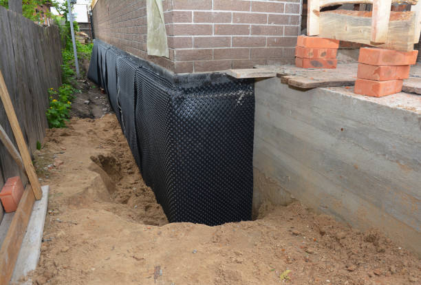 Happy homeowners after waterproofing job in Conasauga
